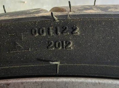 Tyre sidewall with the date stamp 2012, meaning week 20 of 2012